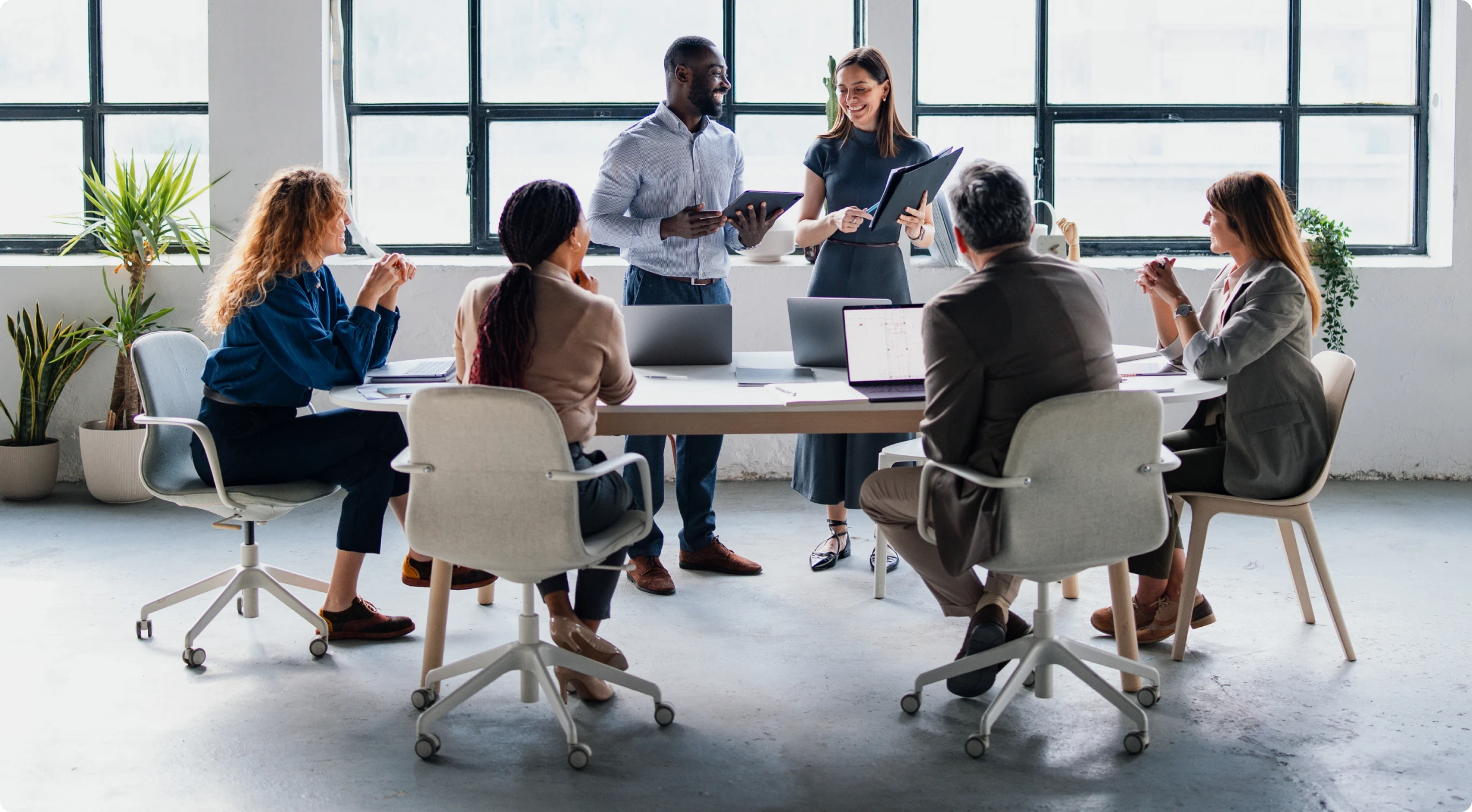 Office team in a meeting discussion.